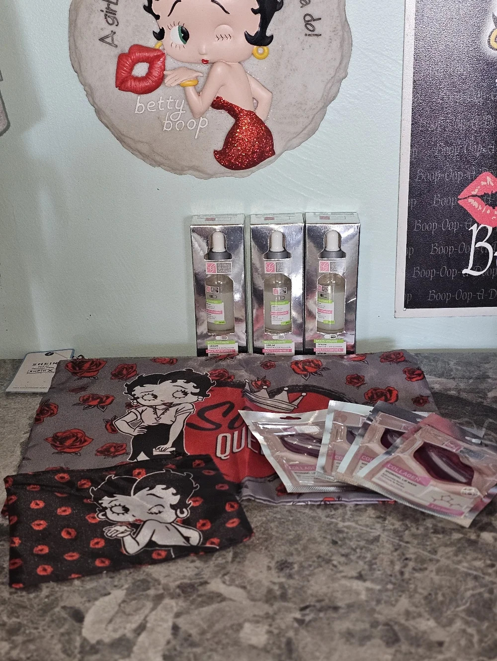 9pc Betty Boop Sassy Queen Tote, Cosmetic Pouch, 3 Serums & 4 Lip Masks!